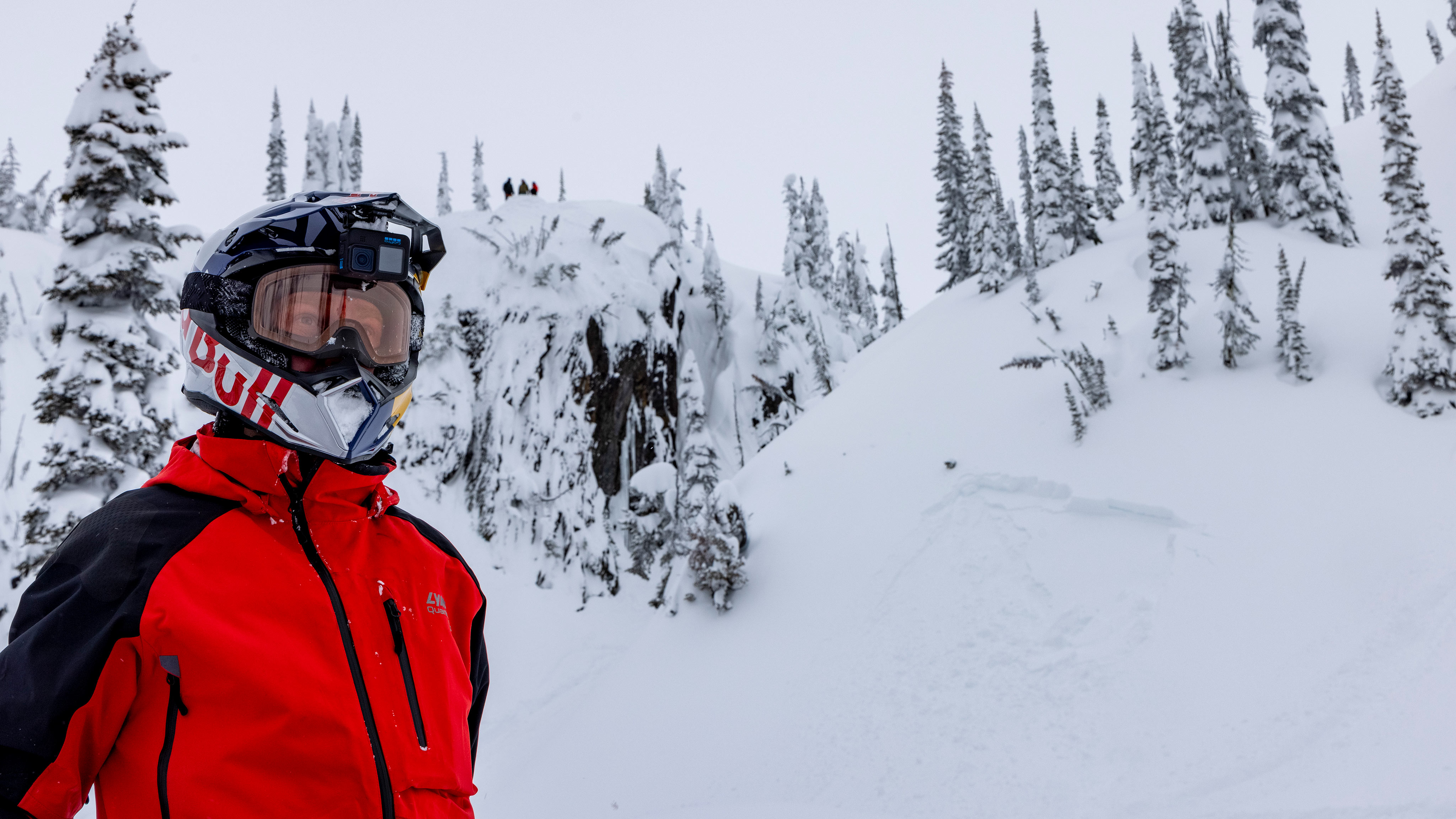 Red Bull snowmobile rider wearing Lynx gear