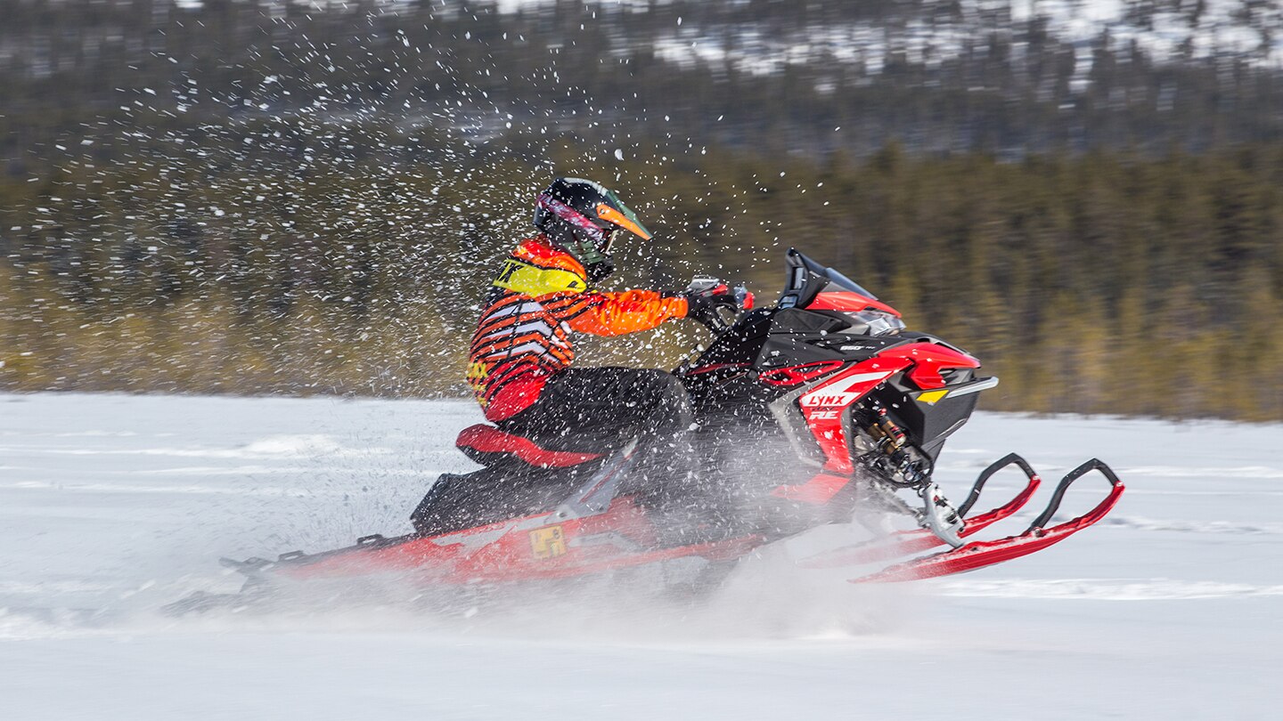 Toni Vilander accelerates with Lynx Rave RE snowmobile.