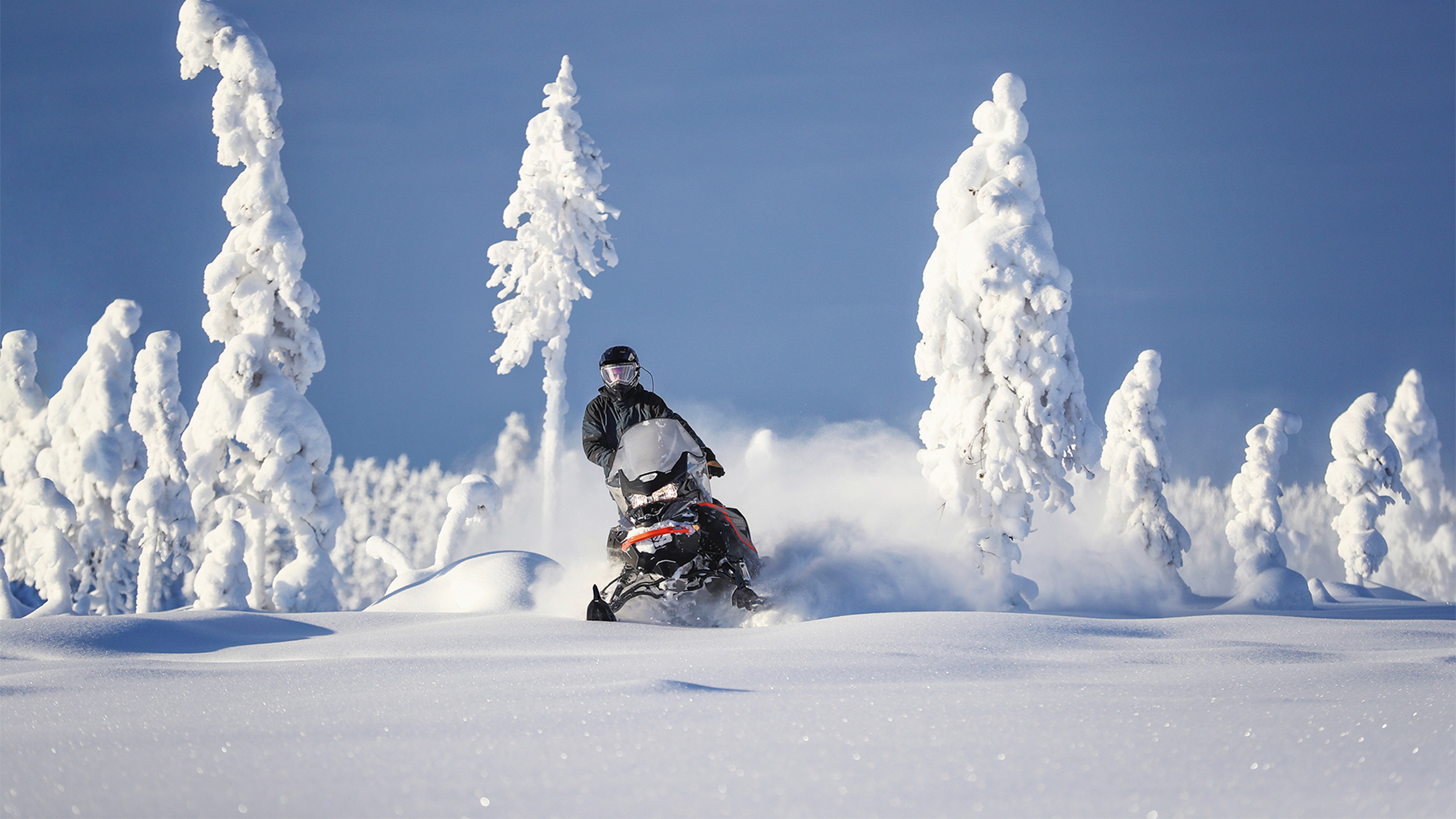 off-trail riding with Commander snowmobile