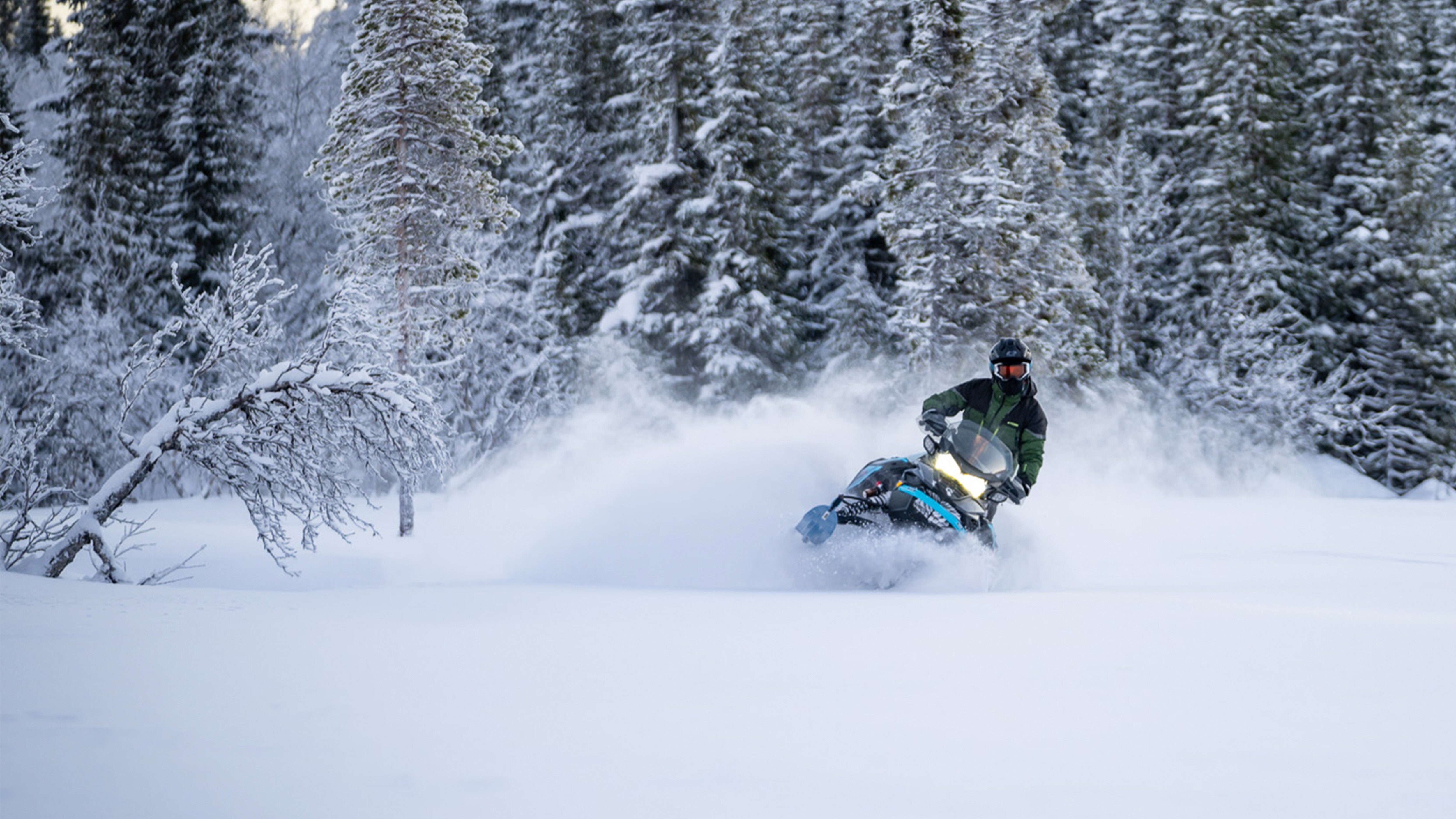 off-trail snowmobiling with lynx Commander